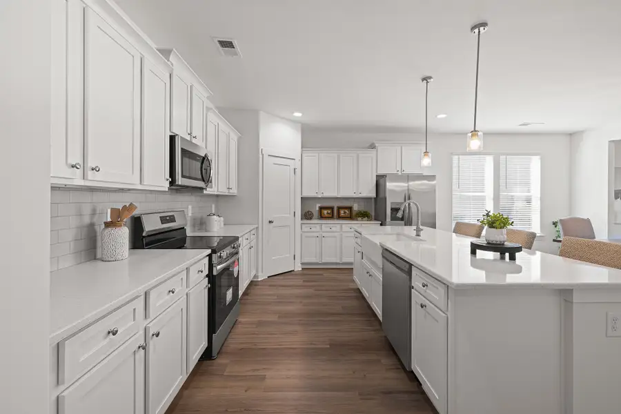 Furnished interior in a model home at Sutton’s Landing in Statham (Image 7).