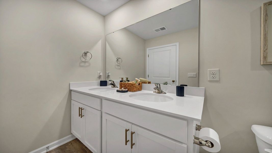 Furnished interior in a model home at Hunter's Branch Townhomes in Hopkins (Image 17).