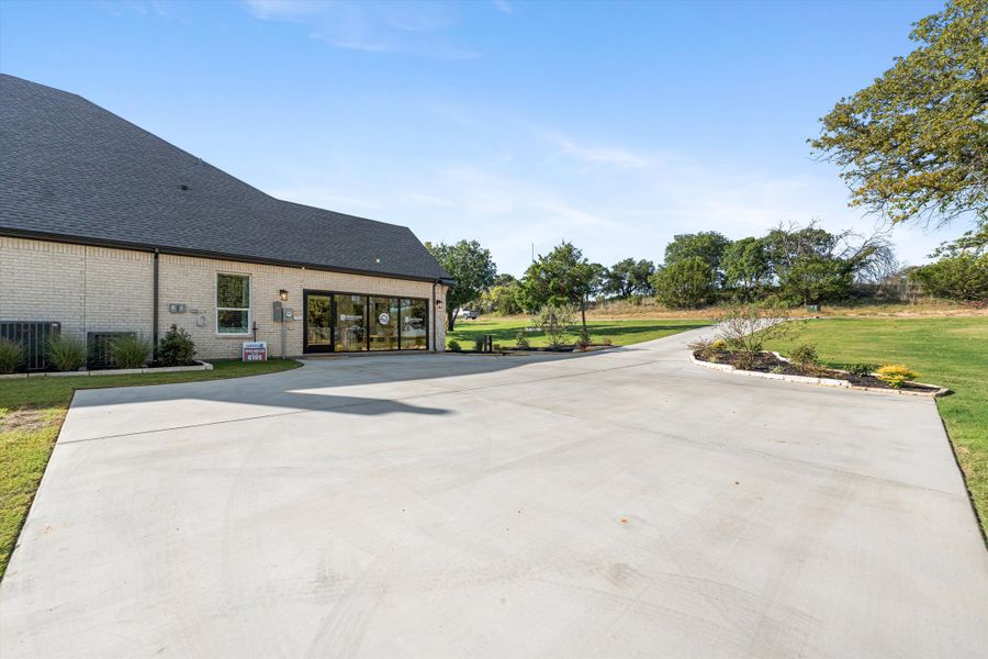 Front exterior of a home in the Oak Grove Addition community, located in Springtown, TX (Image 17).