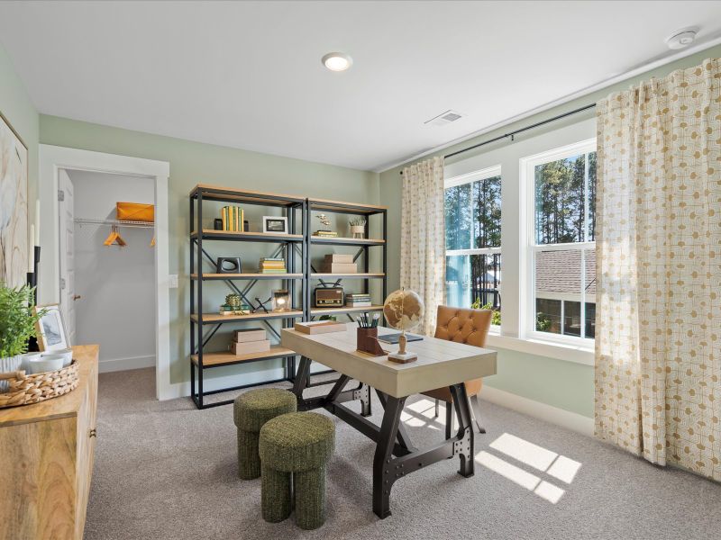 Furnished interior in a model home at The Coves at Lakes of Cane Bay in Summerville (Image 34). Furnished interior in a model home at The Coves at Lakes of Cane Bay in Summerville (Image 34).