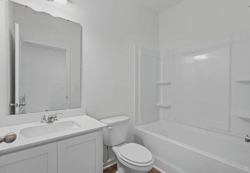 Furnished interior in a model home at Sunset Oaks in Maxwell (Image 14).