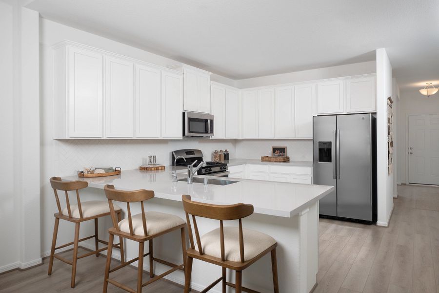 Furnished interior in a model home at Spring Creek Trails in Magnolia (Image 4). Furnished interior in a model home at Spring Creek Trails in Magnolia (Image 4).