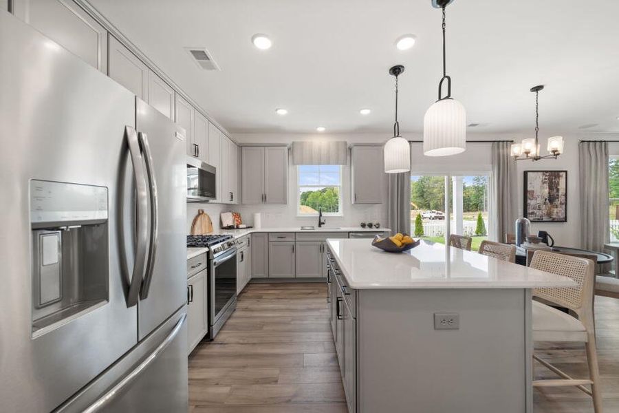 Furnished interior in a model home at Hayes Village in Greensboro (Image 7).