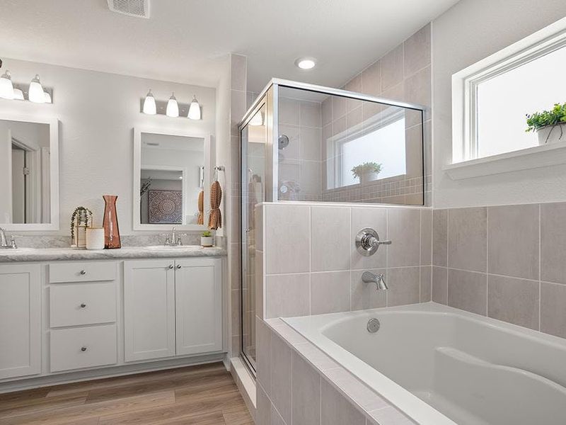 A spa-like garden tub is available in select homes - Parker model home in Ruskin, FL