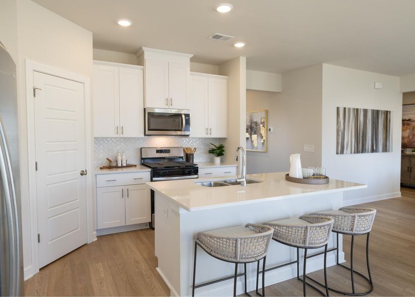 Furnished interior in a model home at Chatham Forest in Duncan (Image 4).