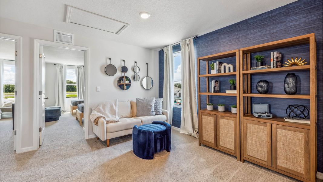 Furnished interior in a model home at Bella Lago in Parrish (Image 22).