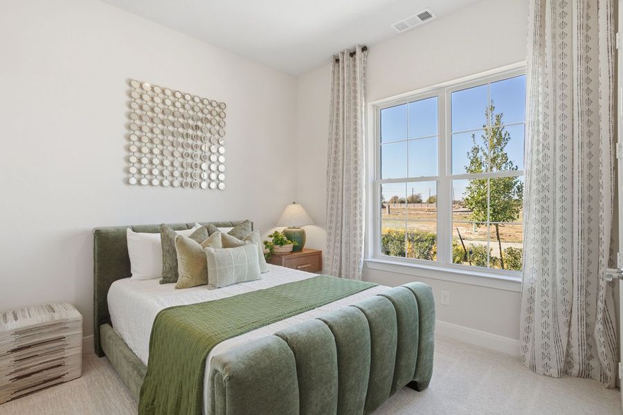 Furnished interior in a model home at Lily Creek at Sutton Fields in Aubrey (Image 42).