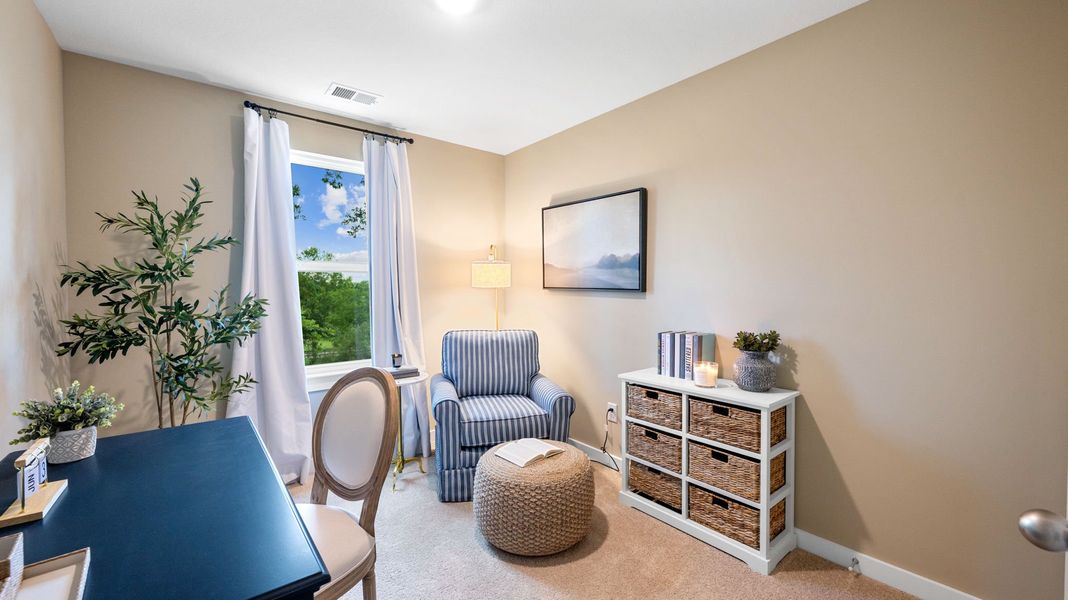 Furnished interior in a model home at Belcourt Landing in Cleveland (Image 19).