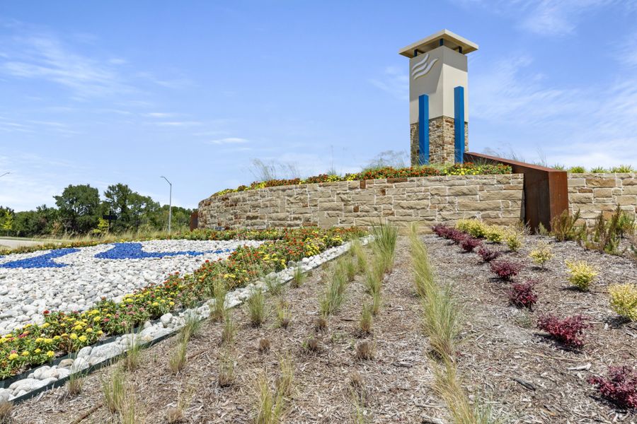 Entrance to the Elevon community in Lavon, TX, featuring signage and landscaping (Image 13).