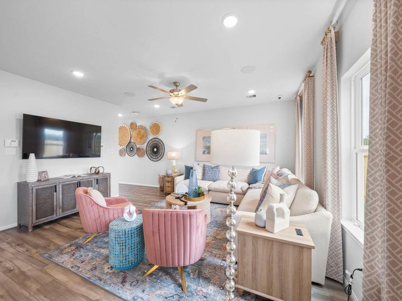 Furnished interior in a model home at Hill & Dale Ranch in Splendora (Image 9).
