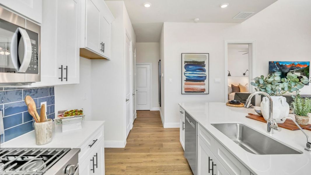 Furnished interior in a model home at The Avenue in Allen (Image 10).