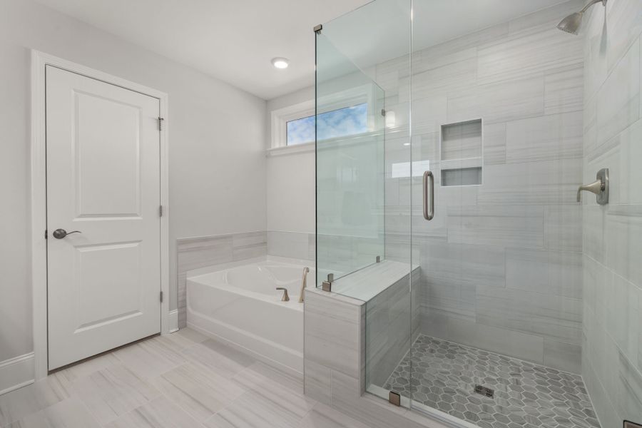 Owner's Bathtub & Glass Shower