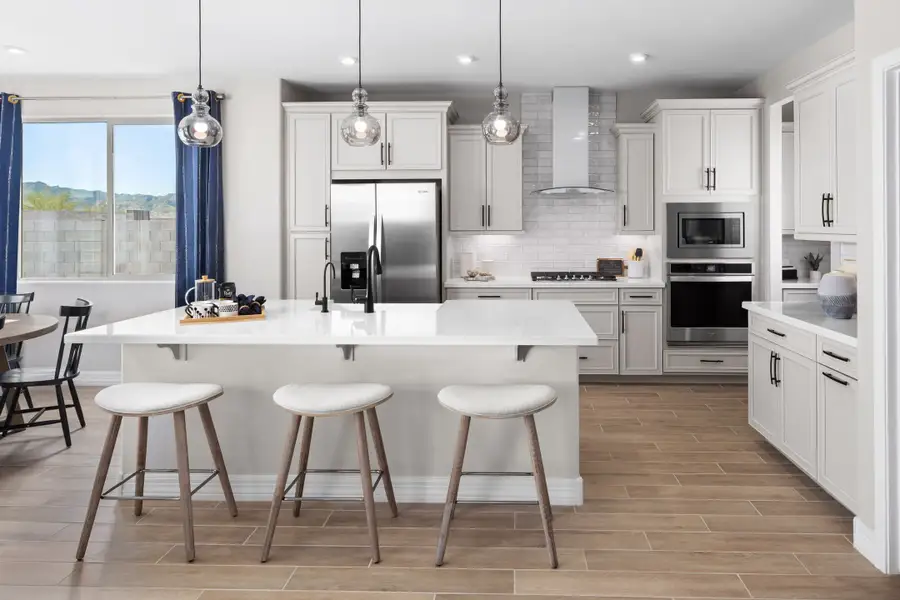 Furnished interior in a model home at Tirreno at IronWing in Litchfield Park (Image 7).