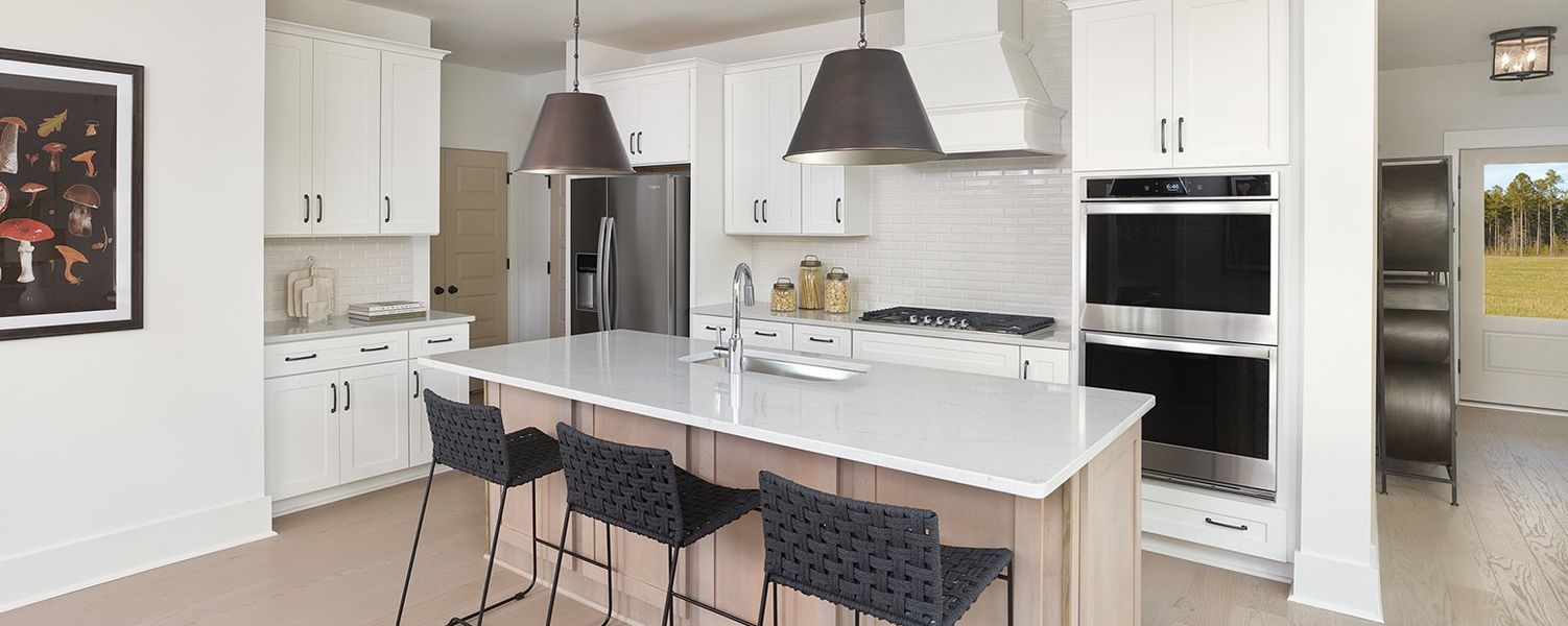 Furnished interior in a model home at Watson Hill in Summerville (Image 7). Furnished interior in a model home at Watson Hill in Summerville (Image 7).