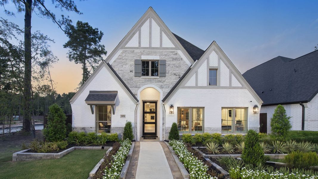 Front exterior of a home in the Woodhavyn 50' community, located in Magnolia, TX (Image 1). Front exterior of a home in the Woodhavyn 50' community, located in Magnolia, TX (Image 1).