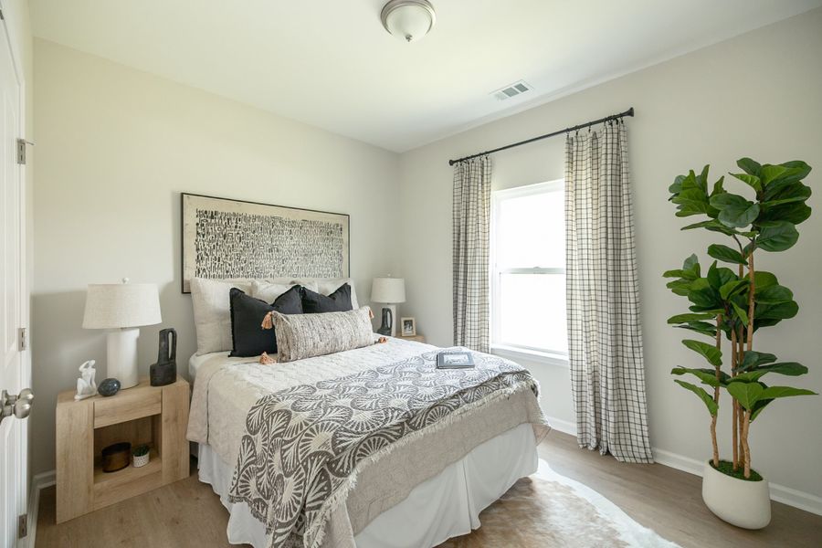 Furnished interior in a model home at Sweetwater in Brunswick (Image 19).