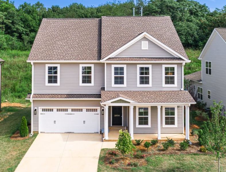Front exterior of a home in the Miller's Reserve community, located in Greensboro, NC (Image 11).