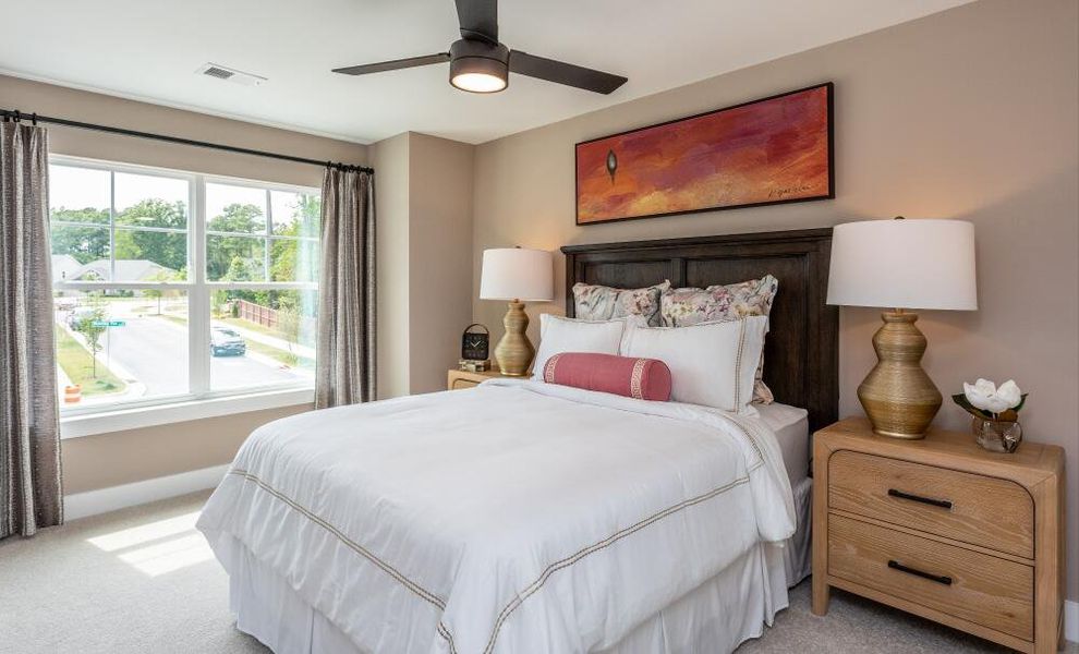 Furnished interior in a model home at Running Brook Townes in Durham (Image 24).