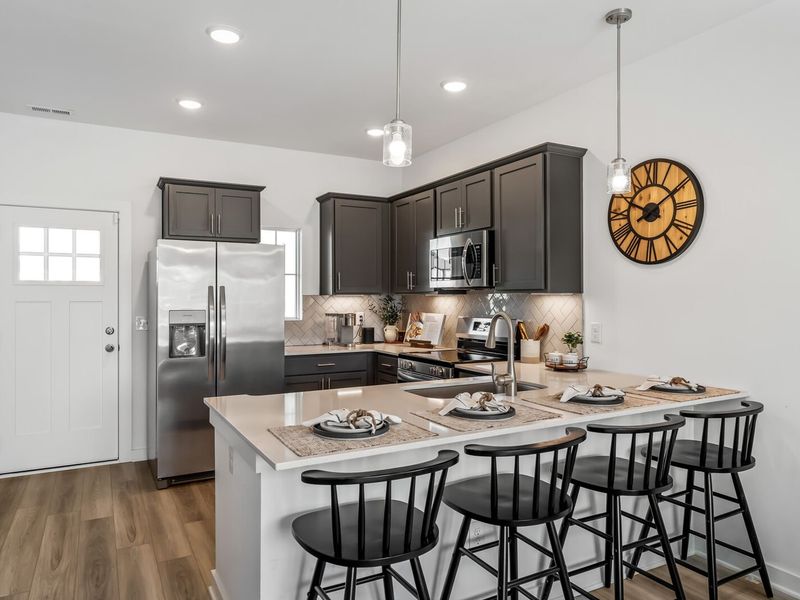 Furnished interior in a model home at The Towns at Red River in Gallatin (Image 9).