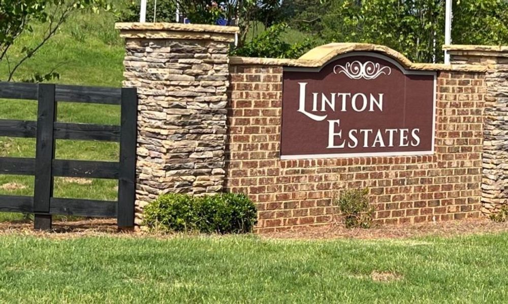 Entrance to the Linton Estates community in Newnan, GA, featuring signage and landscaping (Image 1). Entrance to the Linton Estates community in Newnan, GA, featuring signage and landscaping (Image 1).