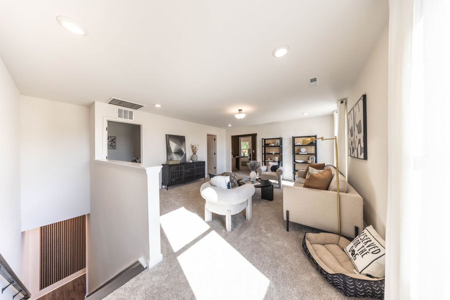 Furnished interior in a model home at College Park in Louisburg (Image 14). Furnished interior in a model home at College Park in Louisburg (Image 14).