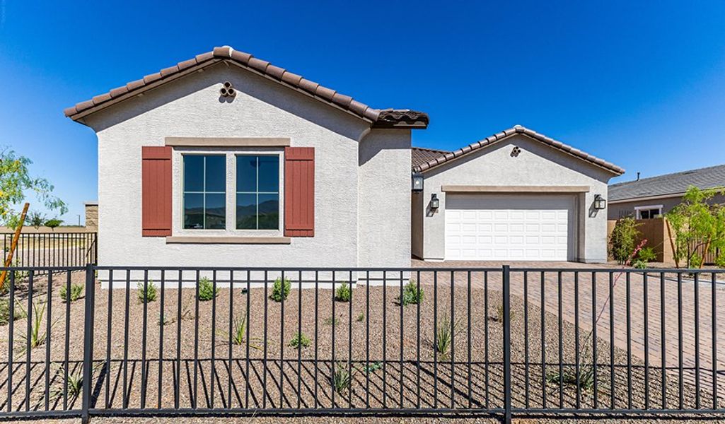 Front exterior of a home in the Retreat at White Tank Foothills community, located in Waddell, AZ (Image 10).
