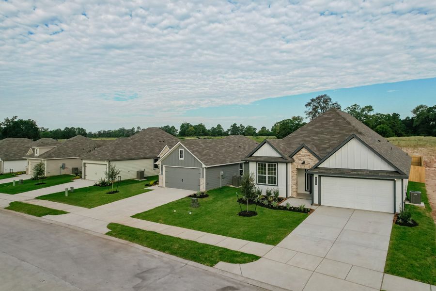 Front exterior of a home in the Rockbridge East community, located in Huntsville, TX (Image 3). Front exterior of a home in the Rockbridge East community, located in Huntsville, TX (Image 3).