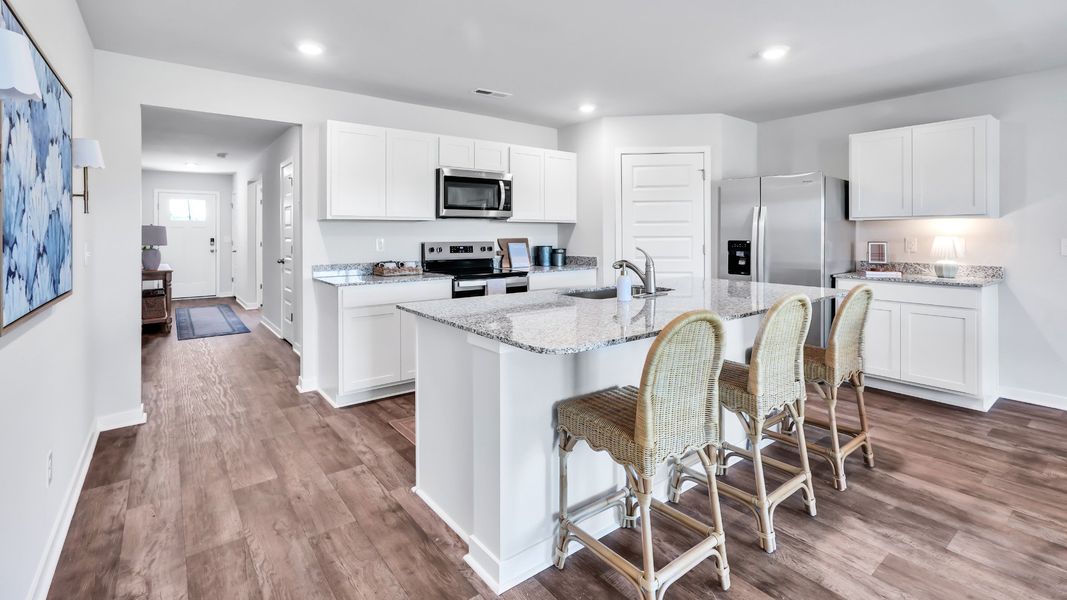 Furnished interior in a model home at Driftwood in Richlands (Image 7).