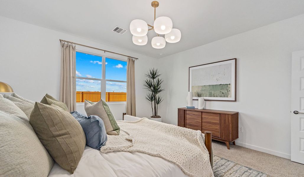 Furnished interior in a model home at Redford Estates in Tucson (Image 20).