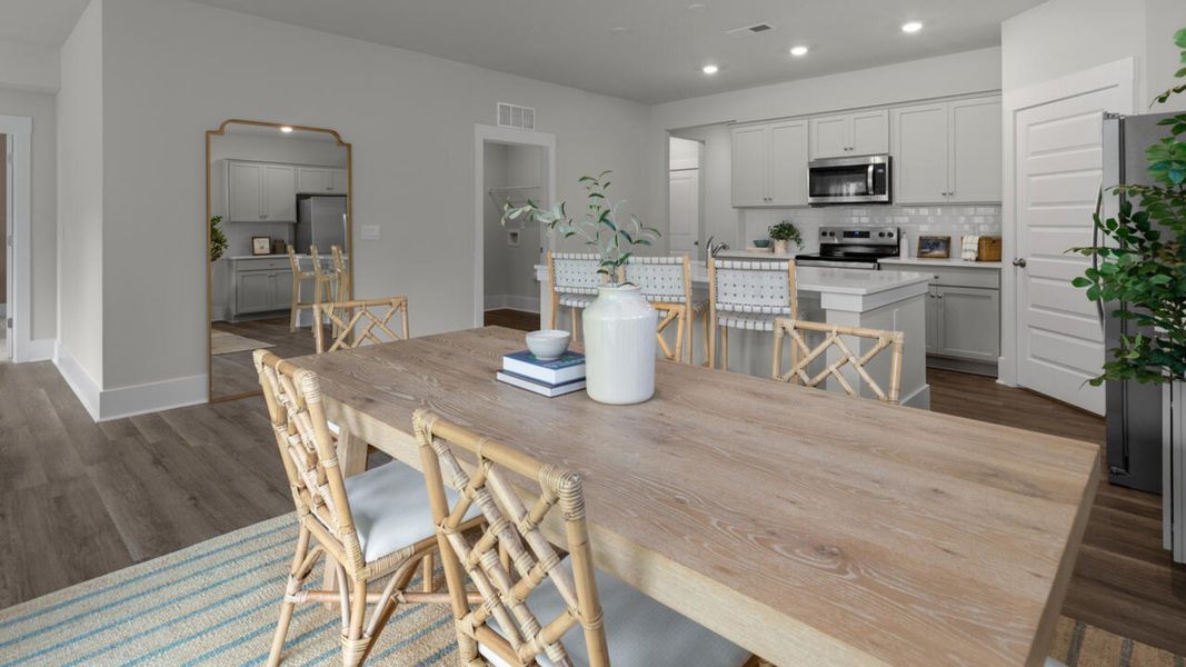 Furnished interior in a model home at The Grove at Blake Farm in Wilmington (Image 25).