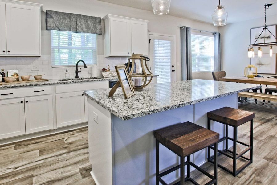 Furnished interior in a model home at The Bend At Pettit Creek in Cartersville (Image 2).