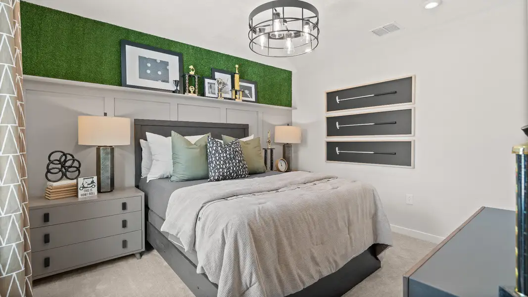 Golf themed second bedroom in the Jupiter Model in Grasslands West.