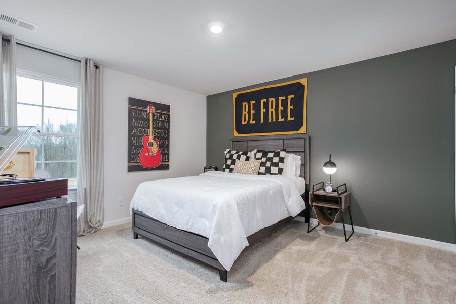 Furnished interior in a model home at Ridge Pointe in Trinity (Image 32).