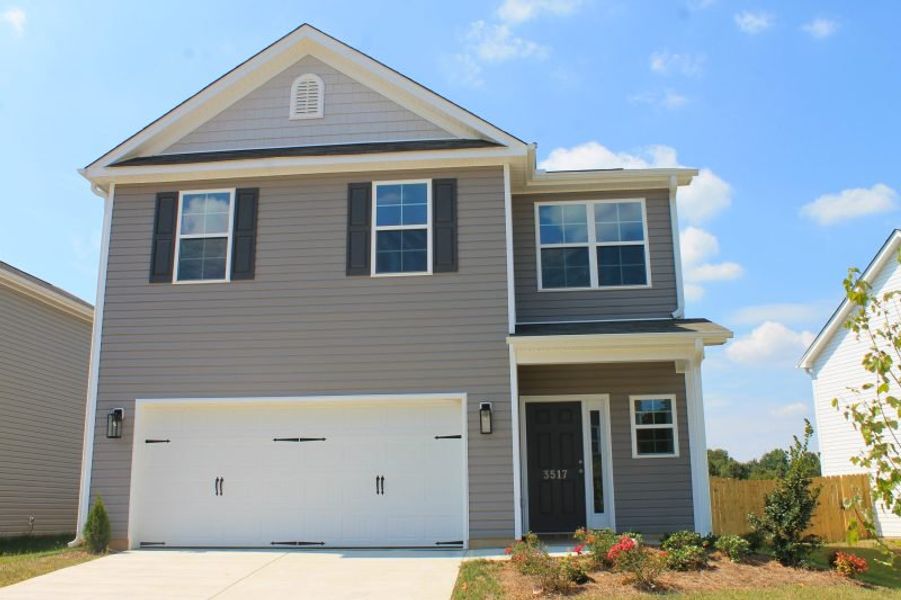 Front exterior of a home in the The Wilcox community, located in Greensboro, NC (Image 16).