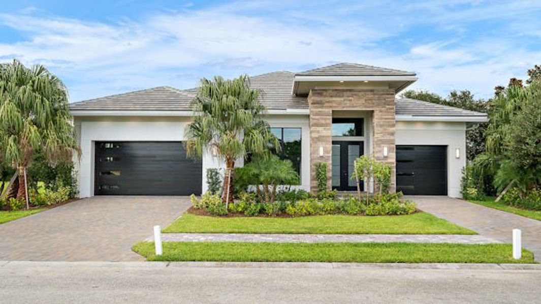 Front exterior of a home in the Tesoro Club community, located in Port St. Lucie, FL (Image 24).