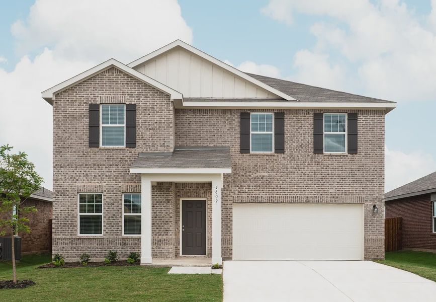 Front exterior of a home in the Sunterra Lakes community, located in Brookshire, TX (Image 4).