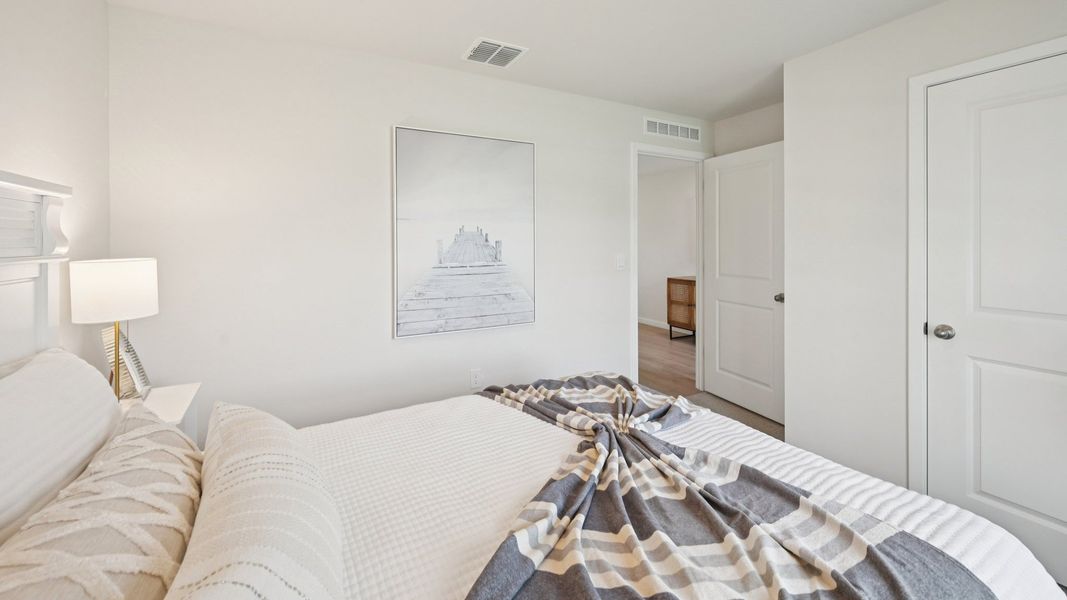 Furnished interior in a model home at Cove at West Port - Express in Port Charlotte (Image 33).