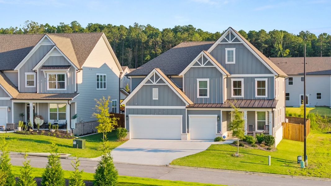 Front exterior of a home in the Hamptons at Riverwood East community, located in Dallas, GA (Image 6).