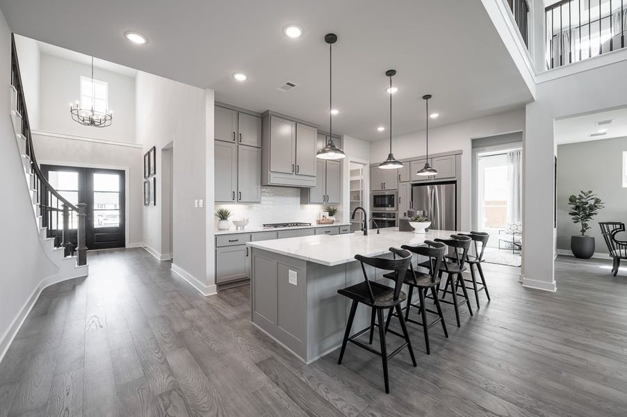 Furnished interior in a model home at Sienna 60’ in Missouri City (Image 10).