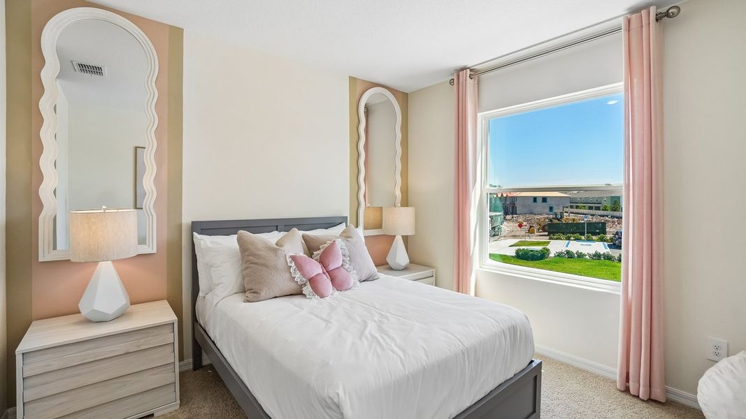 Furnished interior in a model home at Sanctuary at Citrus Park Townhomes in Tampa (Image 21).