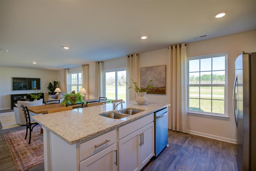 Furnished interior in a model home at Corinth Village in Greensboro (Image 20).