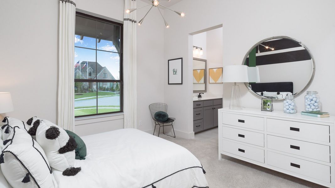 Furnished interior in a model home at Walsh Ranch 60' in Aledo (Image 23).