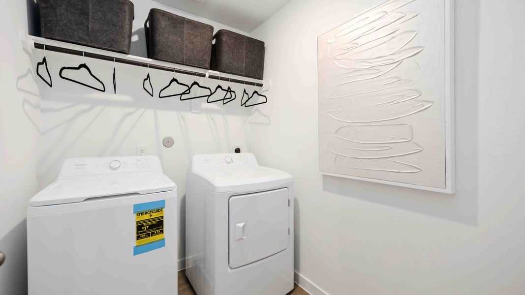 Furnished interior in a model home at Grand West in Houston (Image 19).