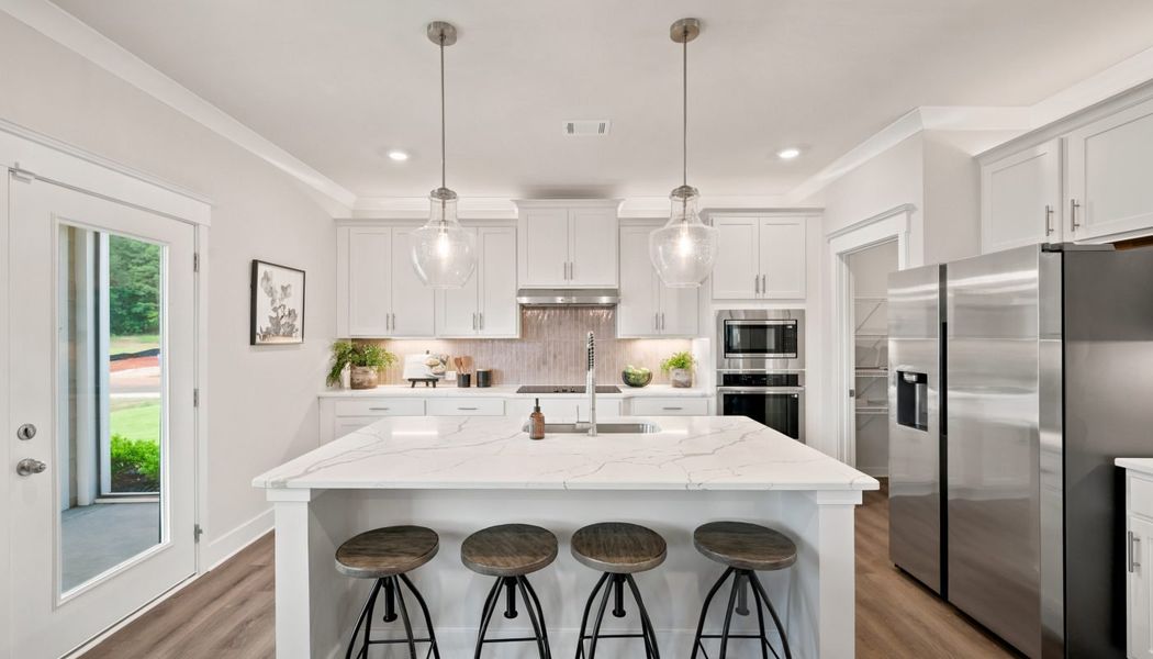Furnished interior in a model home at Greenefield in Cartersville (Image 29).