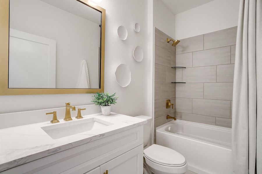 Furnished interior in a model home at MidTowne in Midlothian (Image 38).