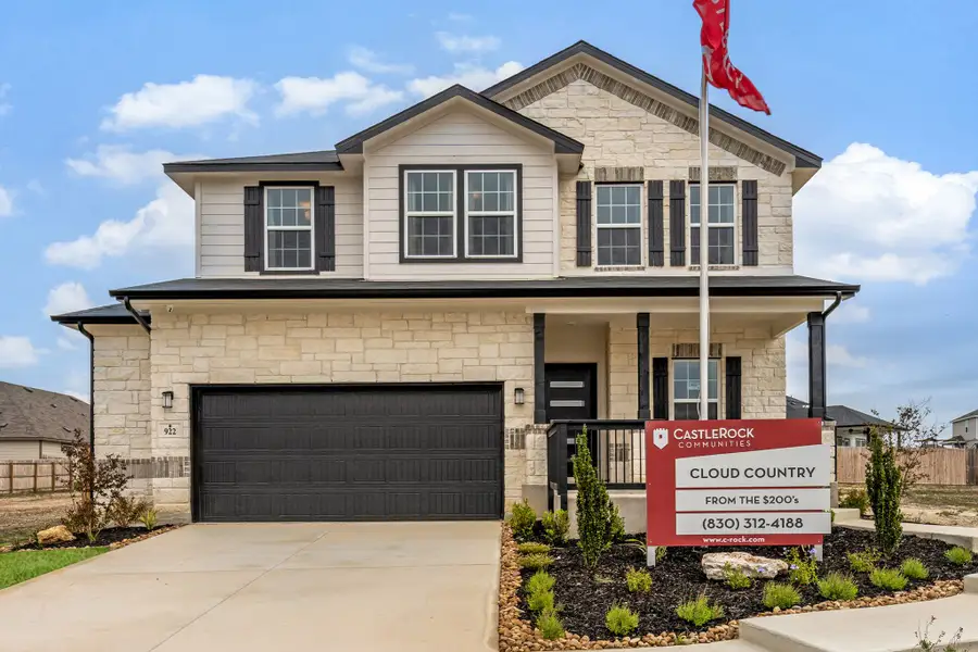 Front exterior of a home in the Cloud Country community, located in New Braunfels, TX (Image 2).