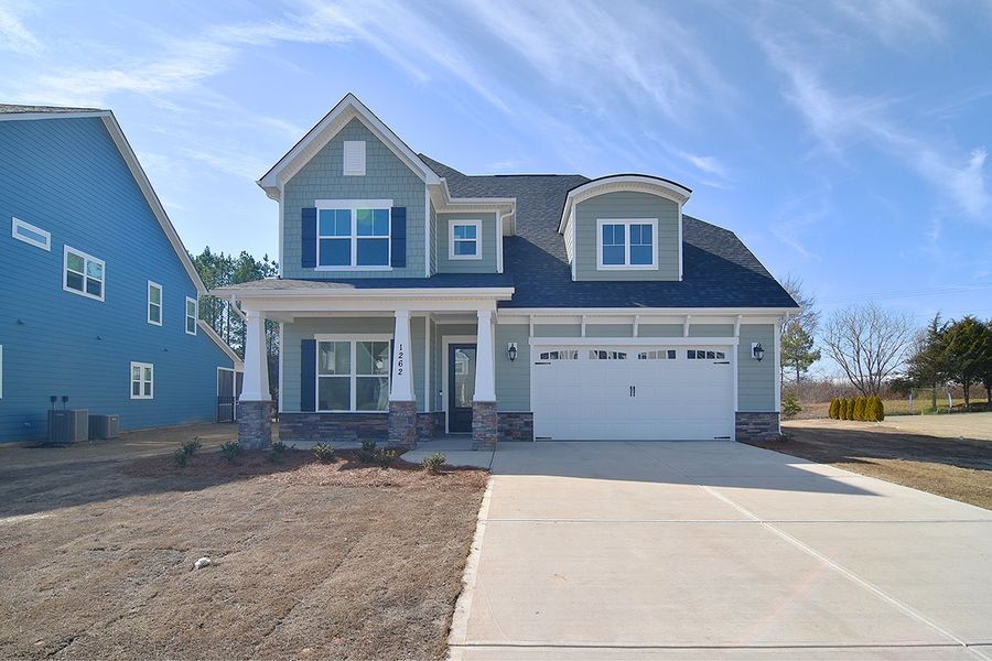 Front exterior of a home in the Wildbrook community, located in Denver, NC (Image 8). Front exterior of a home in the Wildbrook community, located in Denver, NC (Image 8).