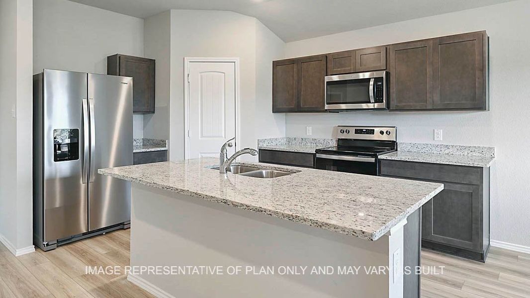 Furnished interior in a model home at Grand Lake in Snook (Image 3).