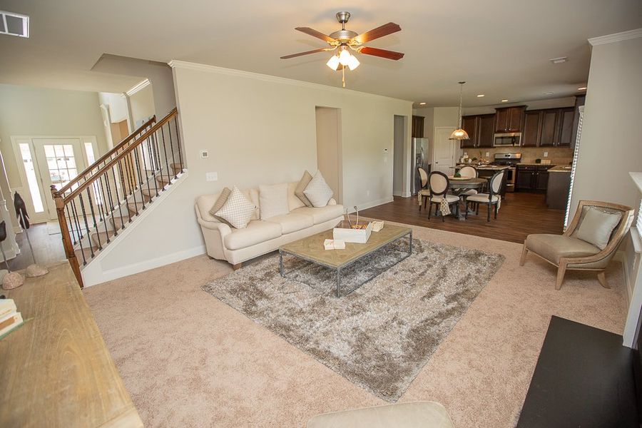 Furnished interior in a model home at River’s Station in Atlanta (Image 4).