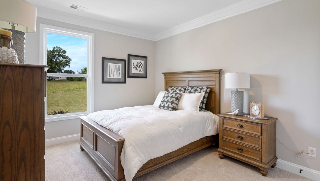 Furnished interior in a model home at Hunters Creek in Greenwood (Image 24).